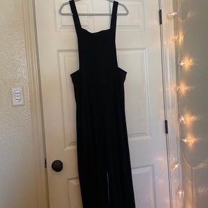 Women’s black corduroy overalls. Size L